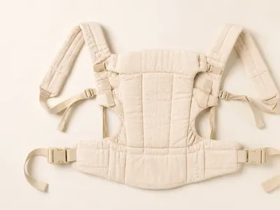 Porte-bébé physiologique en coton posé à plat